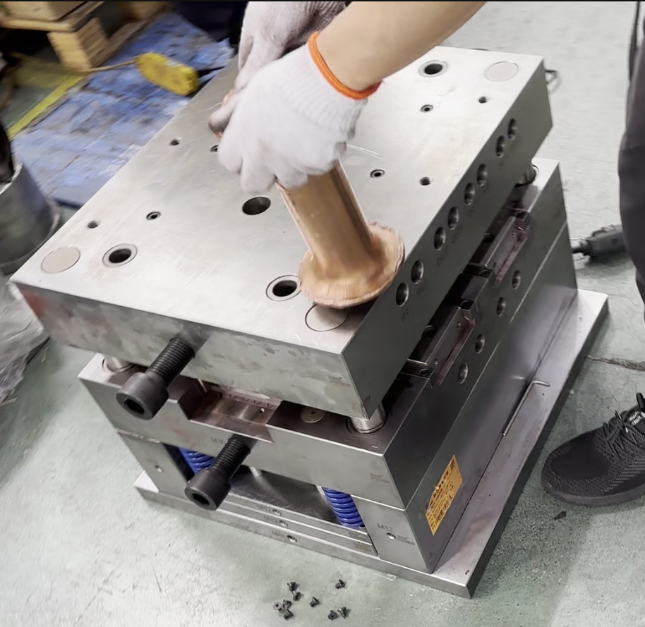 Strike the mold with a hammer blector
